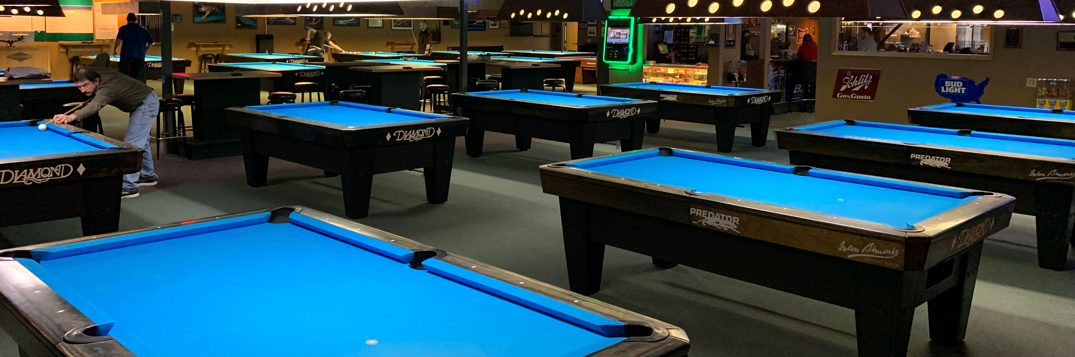 The Carom Room is a premier pool room providing an exceptional experience with Diamond billiard tables, tournaments, leagues, a full bar, and food.